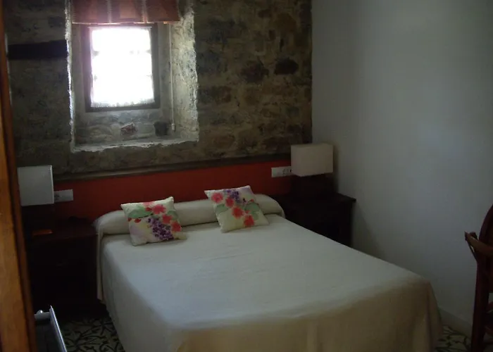 Отель Casona Cuervo Сан-Тирсо-де-Кандамо